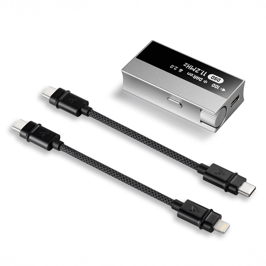 Astell&amp;Kern HC5 portable DAC/amp lying face up with two usb-c cables whitebox