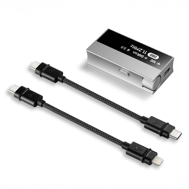 Astell&amp;Kern HC5 portable DAC/amp lying face up with two usb-c cables whitebox