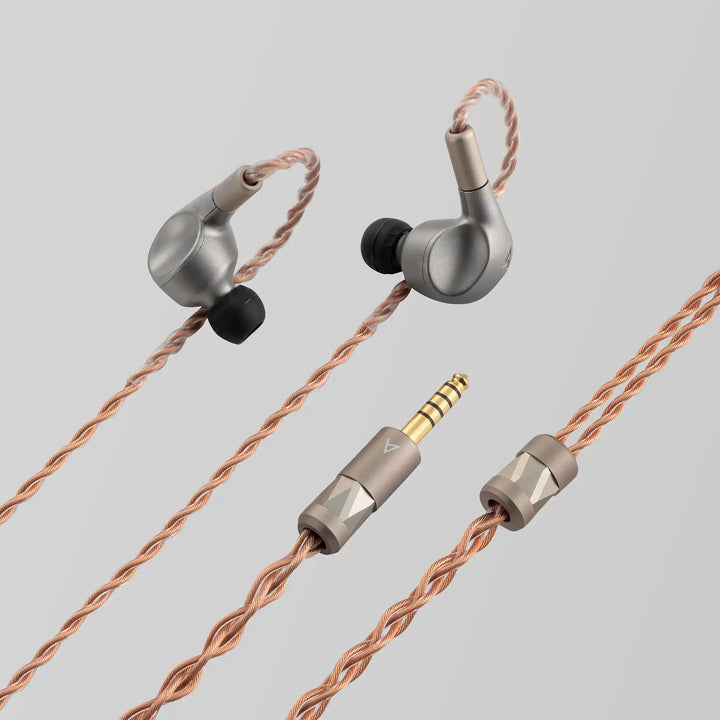 Astell&amp;Kern LUNA IEMs with cable plug and y-split closeup on grey backdrop 