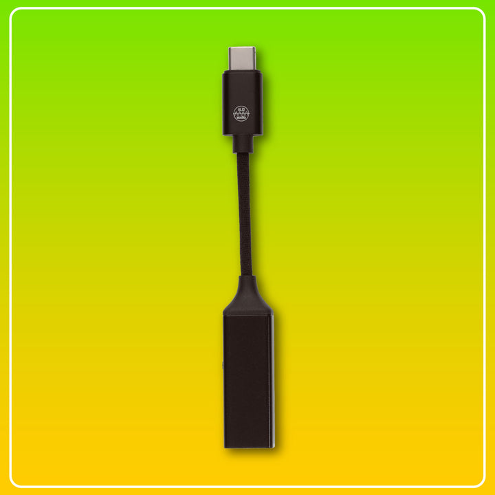 ALO Audio Pilot 2 front over green-yellow gradient background