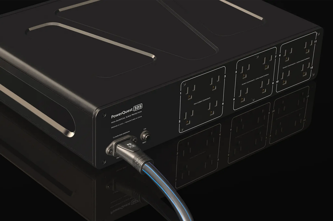 AudioQuest PowerQuest 505 Power Conditioner left rear 3 quarter view sitting on black background