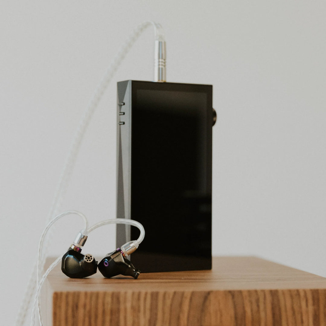 Astell&amp;Kern SP3000M eye level with attached Campfire Audio earphones
