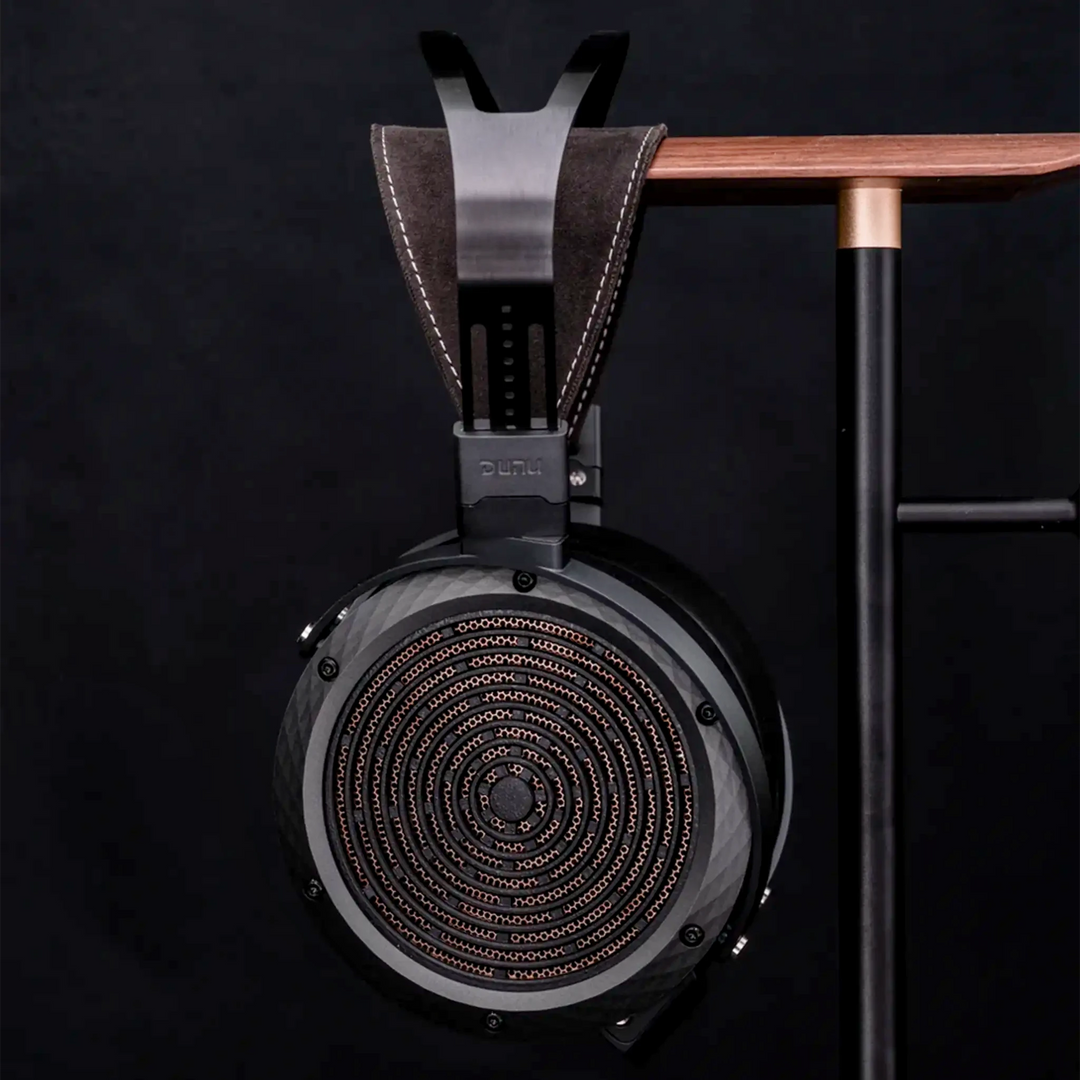 DUNU Arashi left profile hanging on headphone stand with dark background