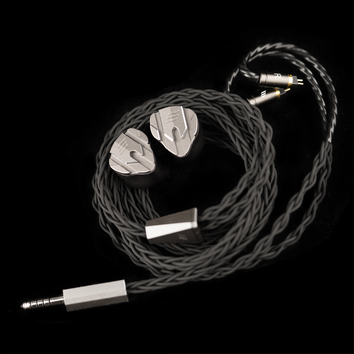 effect audio perseus coiled audio cable with silver connectors on a black background