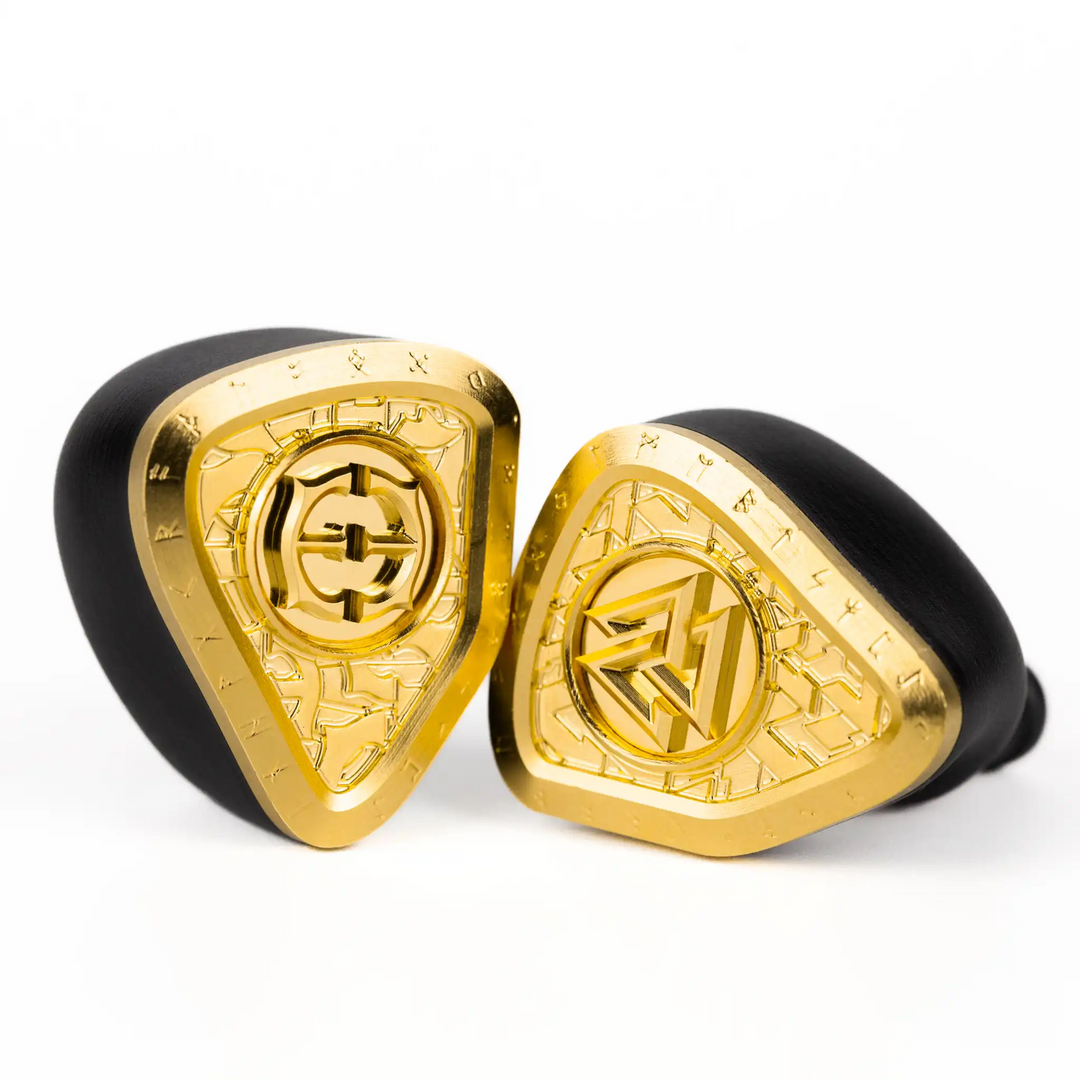 Empire Ears Odin MKII IEMs sitting turned inward at 3 quarter angles x1 sitting on its side whitebox