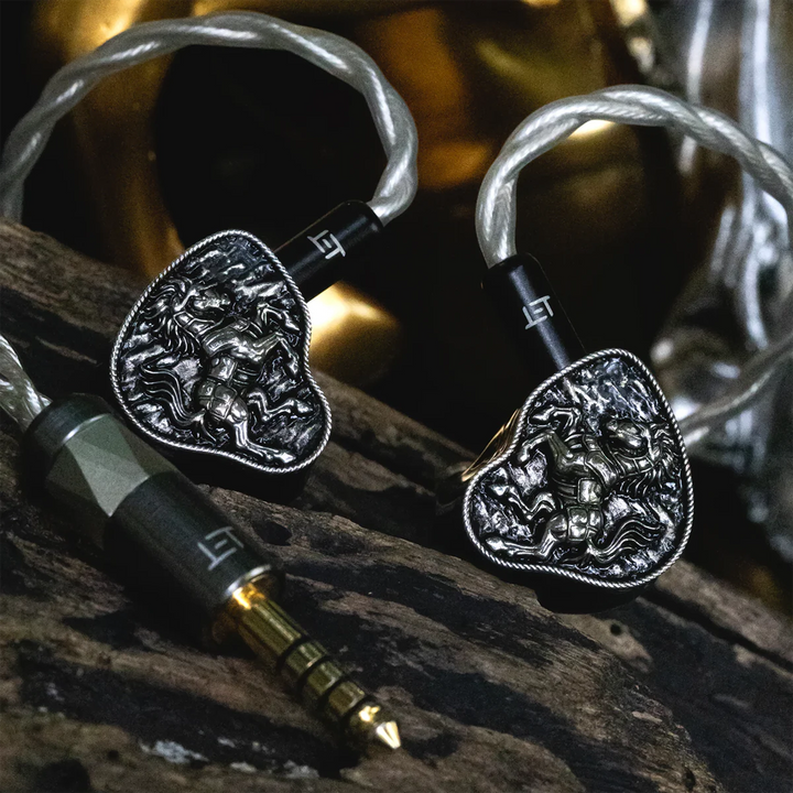 FlipEars Arion IEMs sitting on wood piece front view attached to cable
