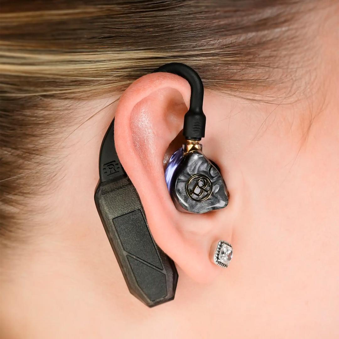 iFi Audio single GO pod Air dac and amp sitting in woman&