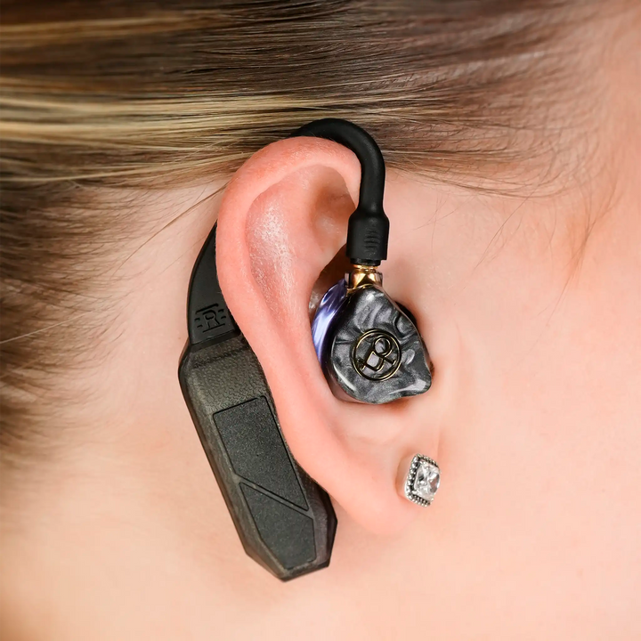 iFi Audio single GO pod Air dac and amp sitting in woman&