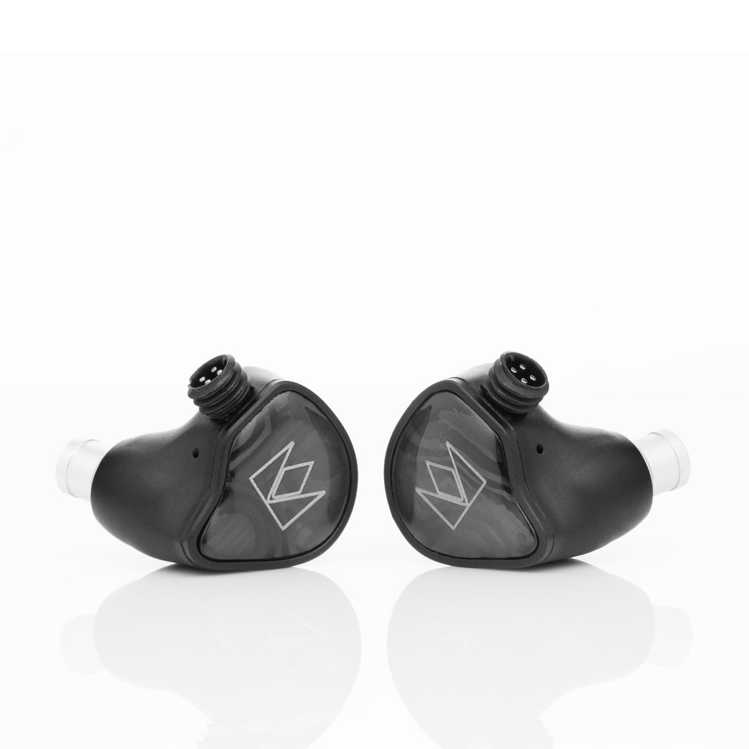 Noble Audio XM-1 front 3 quarter over white reflective background